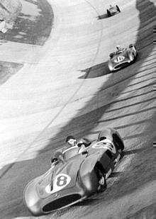 GP Italien, Drei Herren unterwegs: Fangio, Moss und Kling beim Grand Prix von Italien 1955.